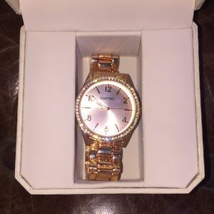 Ellen Tracy rose gold watch